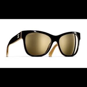 Black and gold Chanel sunglasses